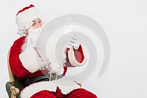 Santa Claus Reading Letter isolated over white baclground