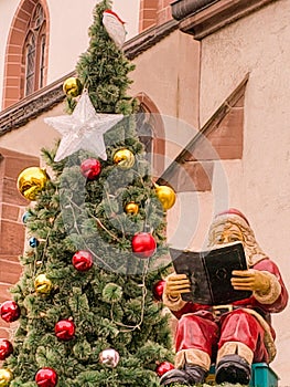 Santa Claus reads her order book very carefully