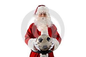 santa claus ready to the soccer match with soccerball in hand
