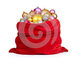 Santa Claus red bag with Christmas toys isolated on white background. File contains a path to isolation