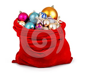 Santa Claus red bag with Christmas toys isolated on white background. File contains a path to isolation