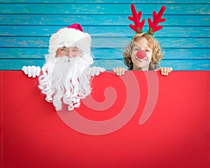 Santa Claus and reindeer child