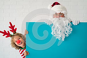 Santa Claus and reindeer child