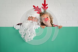 Santa Claus and reindeer child