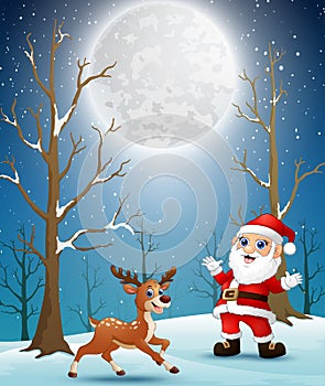 Santa claus with reindeer at christmas winter night