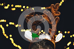 Santa Claus reindeers horns,antlers with sparkling bokeh Christmas background colorful cheerful design for holiday