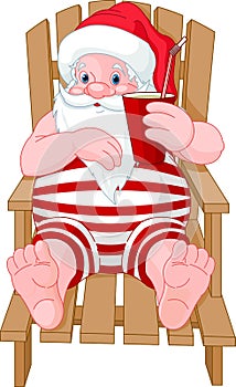 Santa Claus relaxing on the beach