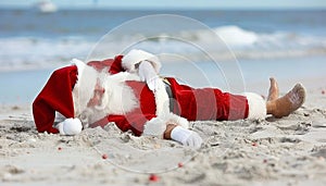 Santa claus relaxing on tropical beach with copy space, christmas holiday concept.