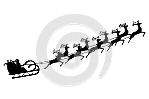 Santa Claus rides in a sleigh in harness on the reindeer