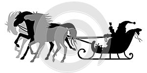 Santa Claus rides a sleigh pulled by three horses