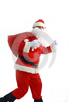 Santa Claus running with the bag of the presents