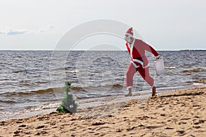 Santa claus is running with gifts  delivery   vacation christmas new year