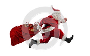 Santa claus runs fast to deliver all gifts