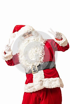 Santa Claus showing V victory sign on white background