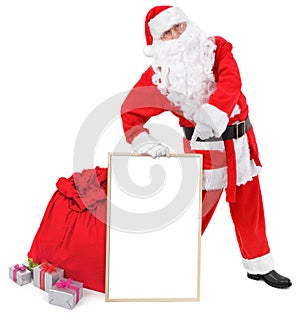 Santa claus shows blank white board