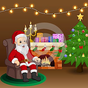 Santa Claus sitting in armchair near fireplace and Christmas tree in living room