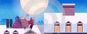 santa claus sitting lotus pose on the roof of house building merry christmas happy new year winter holidays celebration