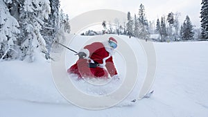 Santa Claus skiing downhill