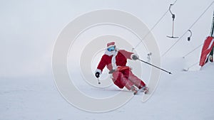 Santa Claus skiing downhill