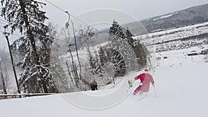 Santa Claus skiing downhill