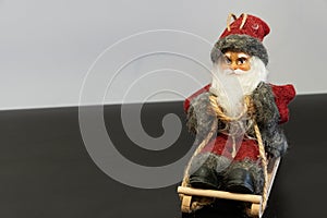 Santa Claus on a sleigh - Christmas card in a black white background