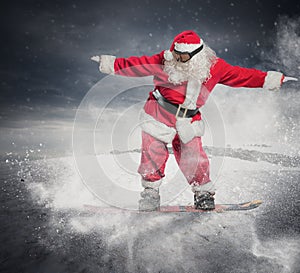 Santa Claus with snowboard