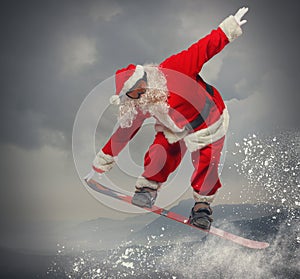 Santa Claus with snowboard