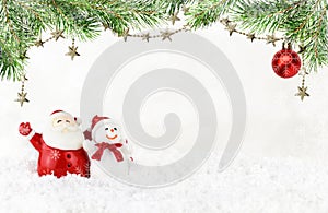 Santa Claus and snowman with spruce twigs and fistive decorations on white bokeh background with snowflakes frame for New Year and