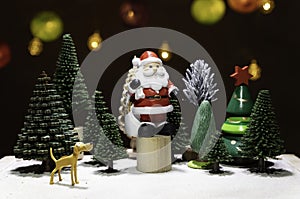 Santa Claus stand on circle wooden chair with dog watching among Christmas tree