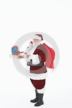 Santa Claus Standing With Bag And Gifts