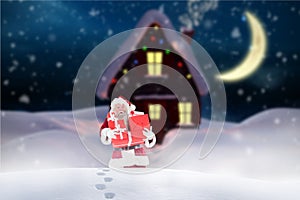 Santa claus standing in snow against digitally generated background