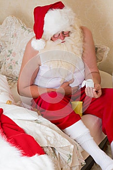 Santa Claus with stomach ache