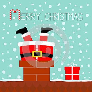 Santa Claus stuck in the chimney on the roof. Gift box. Red