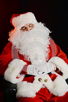 Santa Claus taking a nap on the armchair