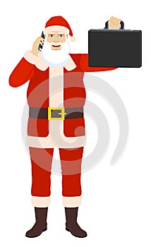 Santa Claus talking on the mobile phone and holding briefcase