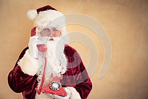 Santa Claus talking on phone