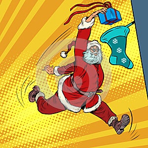 Santa Claus throws a gift into a Christmas sock, like a basketball player throws a ball into a basket. Christmas and New