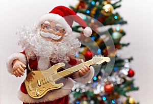 Santa Claus toy playing guitar