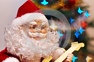 Santa Claus toy playing guitar
