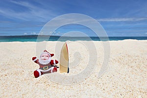 Santa Claus at tropical beach