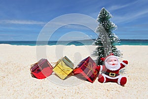 Santa Claus at tropical beach