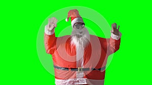 Santa Claus waves to the camera with both hands.