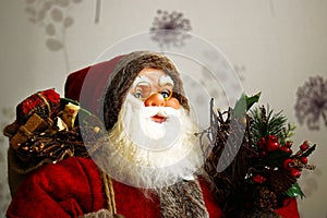 Santa Claus with white beard and red hat