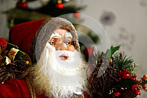 Santa Claus with white beard and red hat