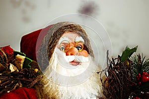 Santa Claus with white beard and red hat