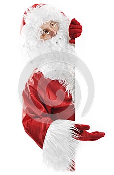 Santa Claus on white holding blank sign