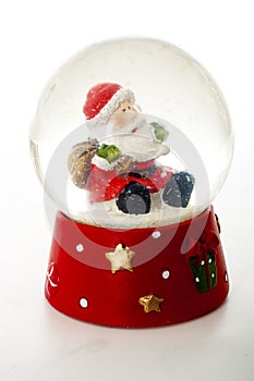 Santa Claus winter holiday christmas snow ball glass ball. Christmas decoration with Santa Claus. Glass ball with snow