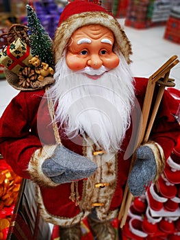 Santa Claus with wooden skis