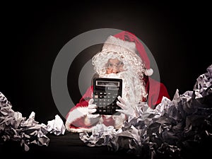 Santa clause with a great heap of crumpled papers.