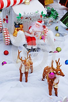 Santa Clause on reindeer sledge.